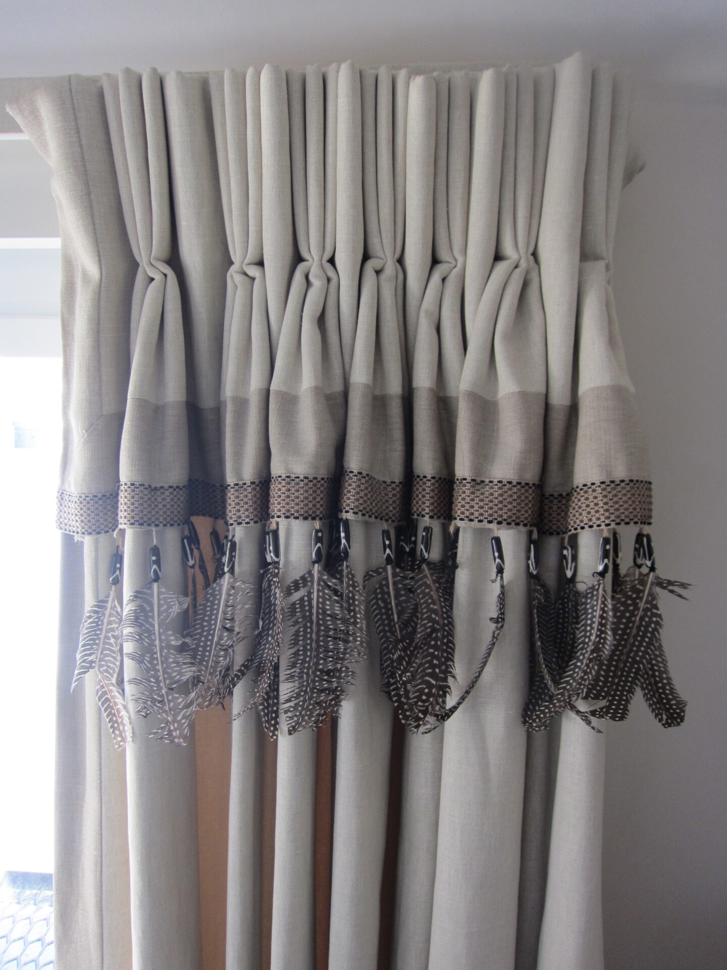 Feather trim on curtains – Number 16 – London – England | Just One Suitcase