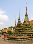 BANGKOK | Lucky charms, a buddha in repose, and monks in training